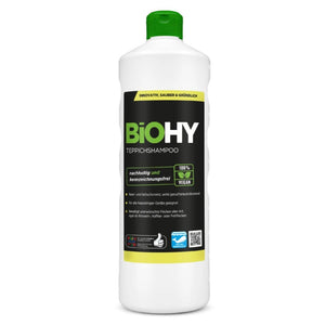 Teppichshampoo in weiĂźer Flasche mit grĂĽnem Deckel