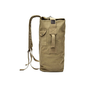Sac à dos brun avec bretelles brunes et poche latérale, vu de côté