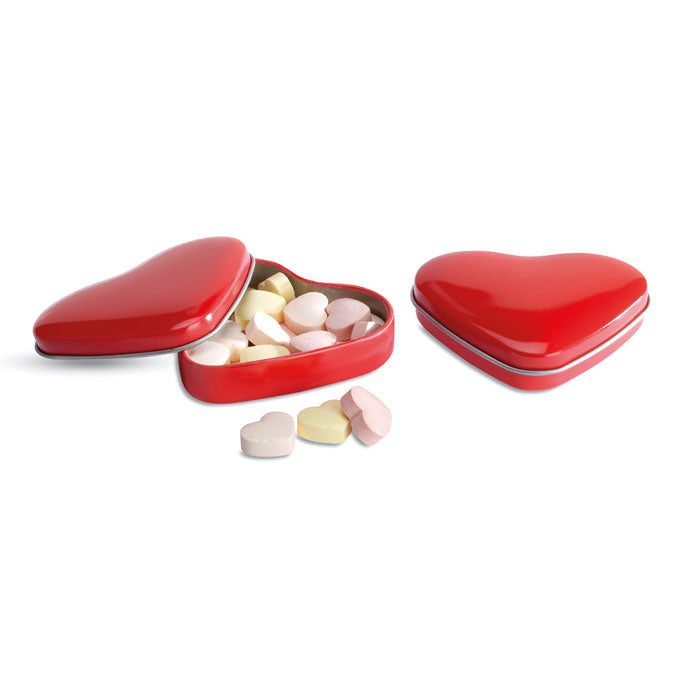 Heart-shaped tin with candies