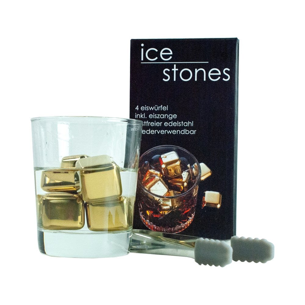 Pierres à rafraîchir dorées en acier inoxydable avec verre et pince devant l'emballage, idéales pour rafraîchir les boissons sans les diluer.