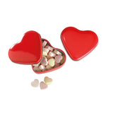 Heart-shaped tin with candies